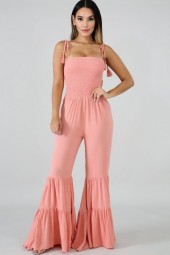 Pretty in Pink: Flirty Flared Jumpsuit with Shirred Tassels and Ruffles